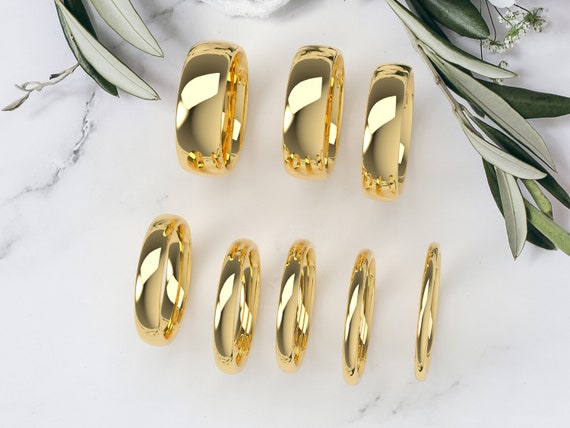 Gold wedding band hoop earrings top