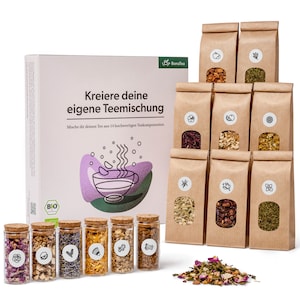 May include: A box of 14 different tea blends in individual brown paper bags. The box is labeled "Kreiere deine eigene Teemischung" and "Mische dir deinen Tee aus 14 hochwertigen Teekomponenten". There are also 8 small glass jars filled with different tea blends.