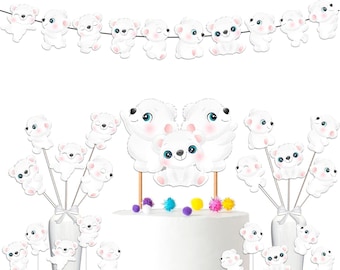 May include: White polar bear cake topper with a family of three bears. The topper is on a white cake with colorful pom-poms. There are also cupcake toppers with individual polar bears.