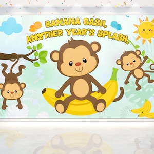 May include: A light blue and green jungle-themed party banner with the text "Banana Bash, Another Year's Splash."  The banner features three cartoon monkeys, a yellow banana, and a yellow sun.