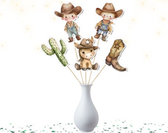 May include: A set of five cowboy-themed party decorations. The decorations include a cactus, a cowboy boot, a horse, and two cowboys wearing hats and vests. The decorations are on sticks and are ready to be placed in a vase or other container.