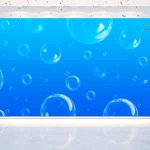 May include: A blue backdrop with a gradient effect, featuring many transparent bubbles of various sizes. The bubbles are scattered across the background, creating a whimsical and playful atmosphere.