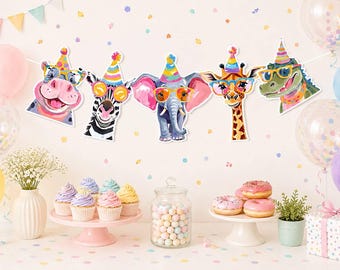 May include: A party banner featuring five animal cutouts including a hippo, zebra, elephant, giraffe, and crocodile. Each animal wears a colorful striped party hat and bright-rimmed glasses. The banner is displayed above a table with cupcakes.