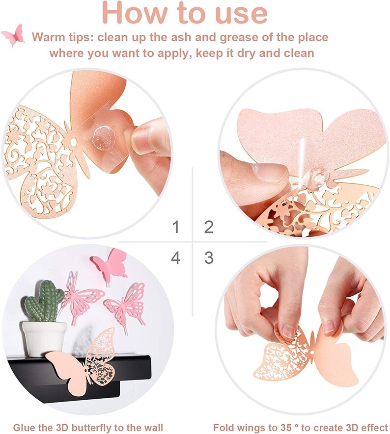 May include: Instructions on how to use 3D butterfly wall decor. The image shows a hand holding a butterfly and folding the wings to create a 3D effect. The image also shows a hand applying adhesive to the back of the butterfly and then attaching it to a wall.