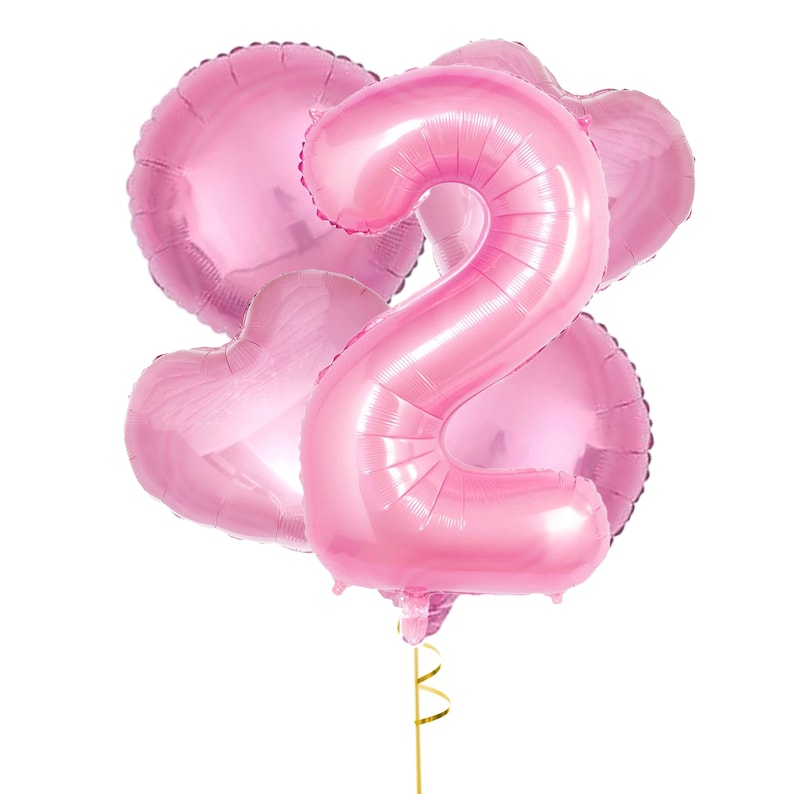May include: Pink number two balloon with two pink heart balloons and a gold ribbon.