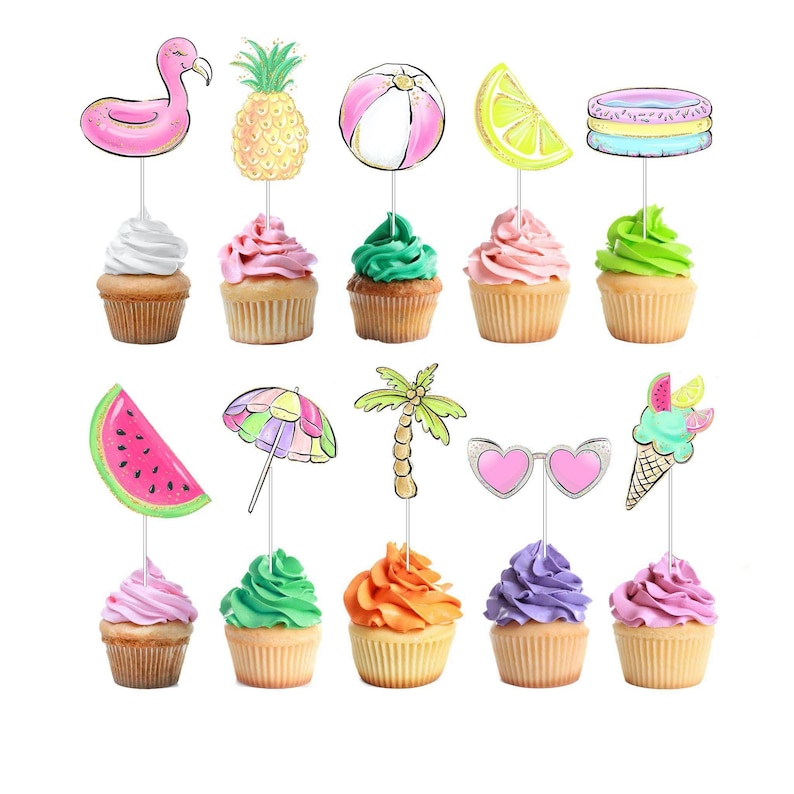 May include: A collection of cupcakes with summer-themed toppers, including a flamingo, pineapple, beach ball, lemon slice, and pool float. The cupcakes have various frosting colors, such as white, pink, green, and orange. The toppers are attached to the cupcakes with thin silver sticks.