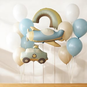 May include: A blue and yellow airplane balloon, a blue and yellow car balloon, a rainbow balloon, and a variety of white, beige, and blue latex balloons.