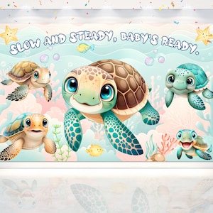 May include: A colorful backdrop featuring a cartoon illustration of four sea turtles with the text "Slow and Steady, Baby's Ready."