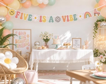 May include: A party banner featuring the text FIVE IS A VIBE with colorful illustrations of a smiley face, daisies, a disco ball, a rainbow, and a roller skate. The banner is displayed above a table with a white tablecloth, a cake, and balloons.
