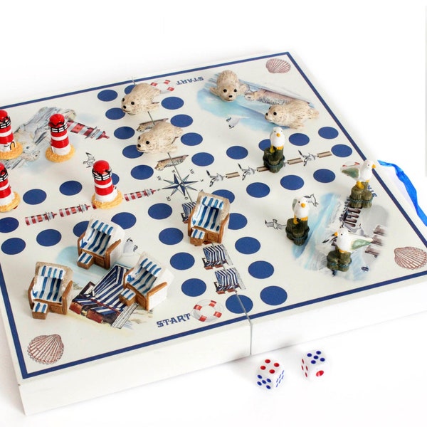 Board game with maritime figures, beach chair, lighthouse, seagull, seal
