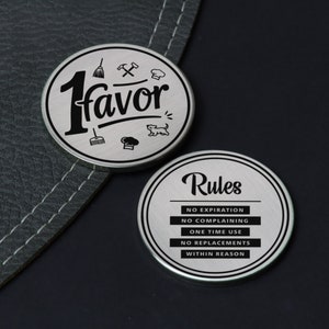 May include: Two silver metal tokens. One token says "1 favor" with a broom, hammer, chef hat, and a dog icon. The other token says "Rules" with the text "No Expiration, No Complaining, One Time Use, No Replacements, Within Reason".