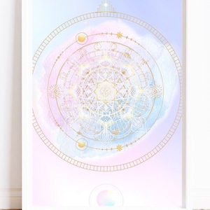 May include: A gold mandala design with a white background and a watercolor wash of pink and blue. The mandala is surrounded by a circle of gold stars and a circle of gold dots.