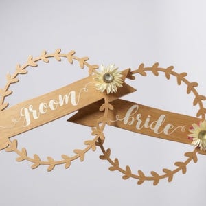 Bride and groom chair wedding signs