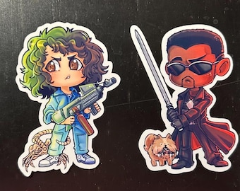 May include: Set of four cartoon-style stickers featuring characters from science fiction films. Each sticker depicts a character with unique attire and accessories, including a flamethrower, a weapon, and a sword.