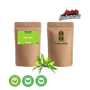 May include: Two brown paper pouches of herbal supplements with green and white labels. One label reads "KACIP FATIMAH" and "Acient Herbs." The other pouch has the "Acient Herbs" logo. The image also includes green leaves and the text "Made in Indonesia."