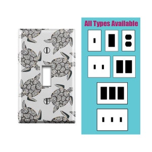 May include: A white light switch cover with a pattern of gray and black sea turtles. The switch cover is available in various styles, including single, double, and triple switches, as well as outlets. "All Types Available" is written in pink text at the top of the image.