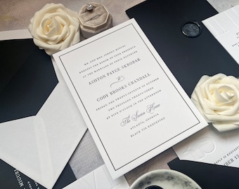 May include: Black and white wedding invitation with a black border. The invitation reads "Mr. and Mrs. Johnny Miodul request the honor of your presence at the marriage of their daughter Ashton Payge Skrobak and Cody Brooks Crandall Friday, the twenty-seventh of October two thousand twenty-three at five o'clock in the afternoon The Swan House Atlanta, Georgia Black Tie Requested".