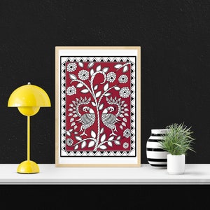 May include: A framed print of a traditional Indian folk art design featuring two peacocks on a red background with black and white details.