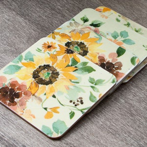 Set of 4 wood-based coasters in yellow with sunflower