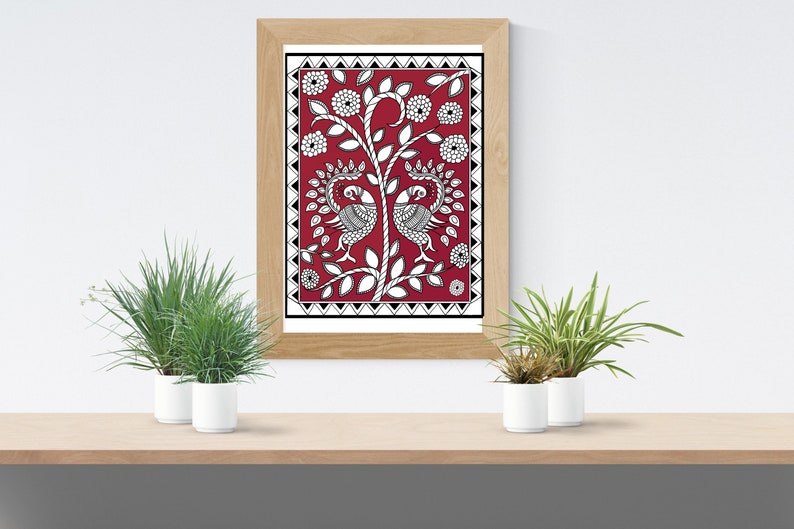 May include: A framed print of a traditional Indian folk art design featuring two peacocks on a red background with black and white details. The design is surrounded by a black and white border.