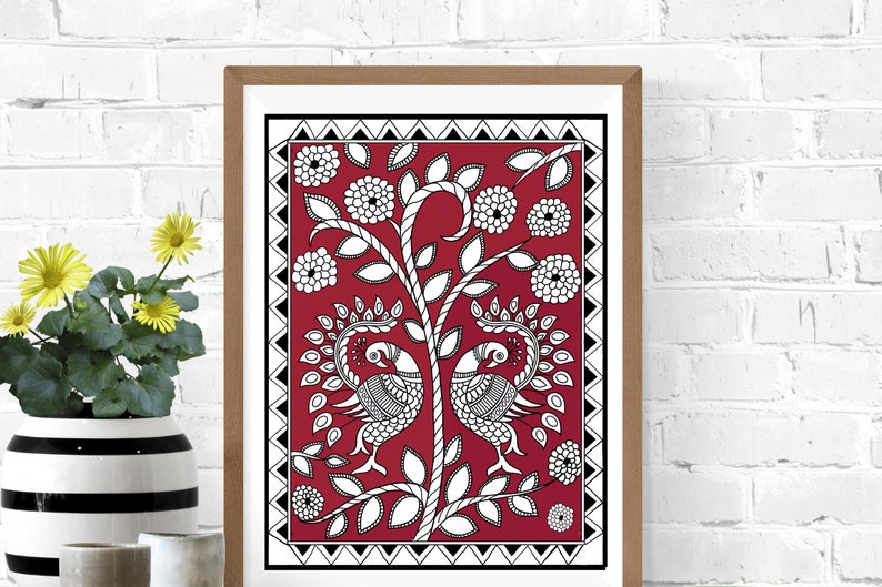 May include: A framed print of a traditional Indian folk art design featuring two peacocks facing each other on a red background with white floral motifs and black outlines.