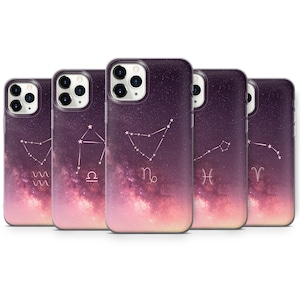 May include: Five different phone cases featuring a galaxy background and a zodiac constellation design. The constellations are Aquarius, Libra, Capricorn, Pisces, and Aries.