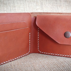 cartera de cuero cosida a mano