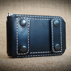 cartera de cuero cosida a mano