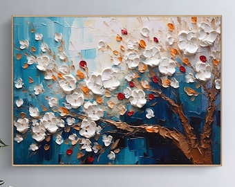 Puede incluir: Una pintura de un árbol de flores blancas con flores rojas sobre un fondo azul y blanco. La pintura está enmarcada en oro.