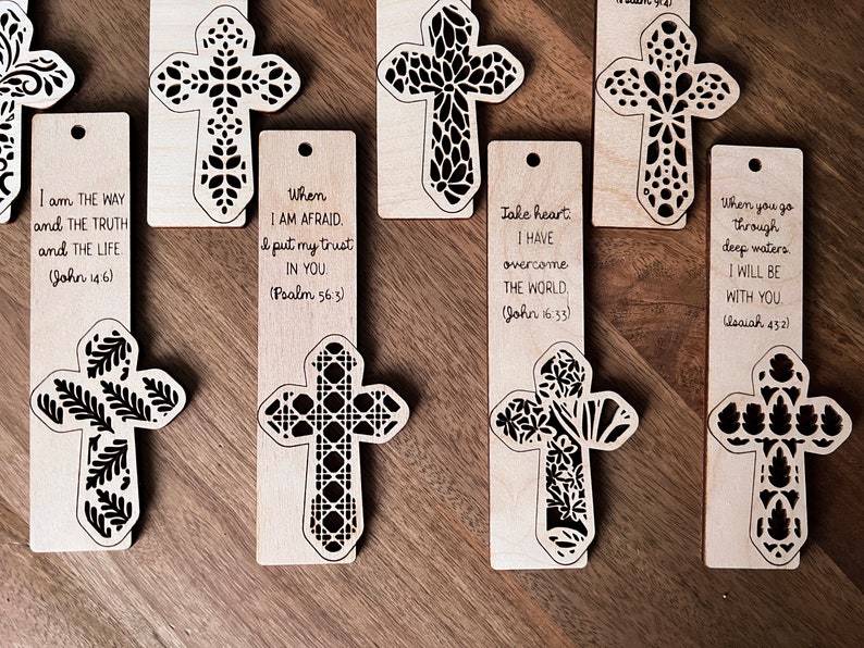 May include: Set of ten wooden bookmarks with a cross design and inspirational bible verses. Each bookmark features a different cross design and a different bible verse.