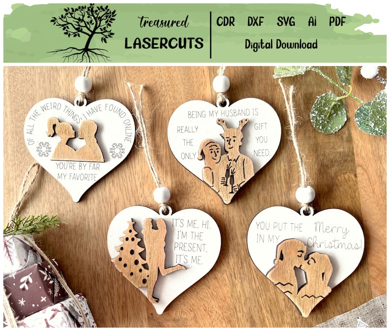 May include: Four laser cut wooden heart-shaped ornaments with different sayings. The first ornament says "Of all the weird things I have found online, you're by far my favorite". The second ornament says "Being my husband is really the only gift you need". The third ornament says "It's me. Hi. I'm the present. It's me.". The fourth ornament says "You put the Merry in my Christmas!"