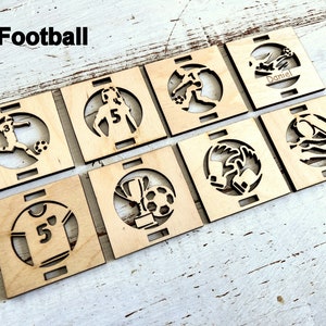 May include: Eight wooden squares with laser cut designs of football players, a trophy, a jersey, and a ball. The word "Football" is written at the top of the image.
