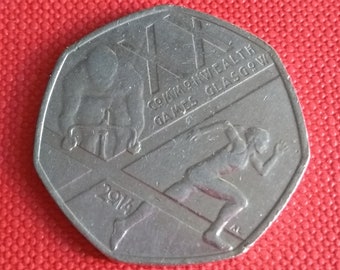 Moneda de cincuenta peniques de 50 peniques de 2014: corredor y ciclista de los Juegos de la Commonwealth de Glasgow (moneda británica del Reino Unido)