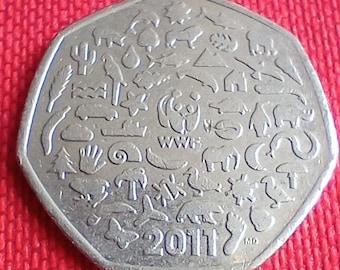 Moneda de cincuenta peniques de 2011 (50 peniques) - Formas de animales - Moneda británica del Reino Unido