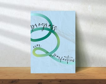 May include: A blue and green abstract design with the text "progress over perfection" on a light blue background.