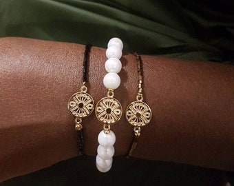 Bracelet white pearls gilded with 18 carat gold