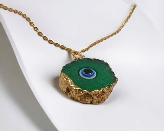 Collier mauvais œil en vert acier et dorure d'or