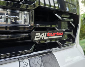 2024-25+  Tacoma Custom Grille 2.4L Turbo Emblem
