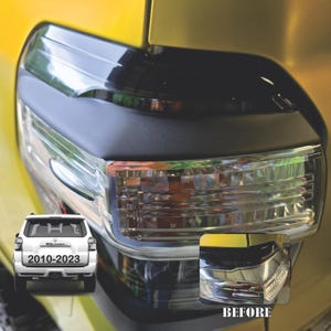 May include: A close-up of a yellow car's rear light with a black and chrome trim. The rear light is clear and has a red lens. The car is a 2010-2023 Toyota 4Runner. The image also shows a before and after picture of the rear light.