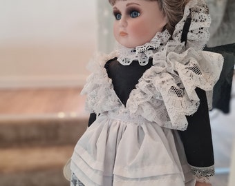 Magdalena haunted negative doll: very active, large 16" antique porcelain