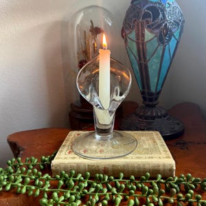 May include: A set of three ceramic mugs with a speckled, matte finish. The mugs are in shades of cream, light gray, and dark gray. Each mug has a simple, minimalist design, perfect for coffee or tea.