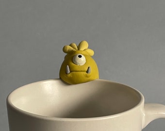 Yellow Monster tea bag holder