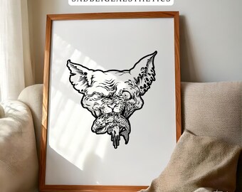 May include: A framed wall art print featuring a black and white ink-style illustration of a snarling cat-like creature biting into a fish. The text SADBEIGEAESTHETICS is printed in a white rectangular box at the top of the wooden frame.