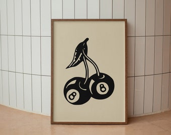 Op de afbeelding: Een ingelijst afdruk van een zwart-witte illustratie van twee kersen met het nummer 8 op elk. De kersen zijn getekend om eruit te zien als biljartballen.