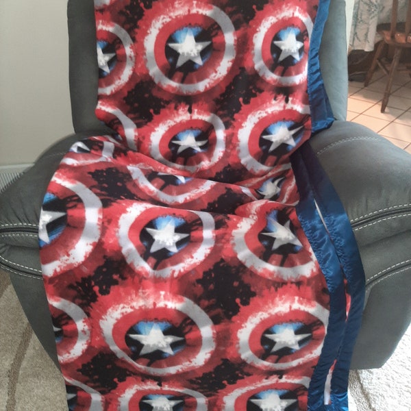Captain America Shield, Adult Big/Tall Fleece Blanket with a  navy blue satin trim