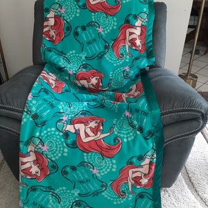 Ariel, Adult Big/Tall Fleece Blanket with a matching dark, shimmering turquoise satin trim