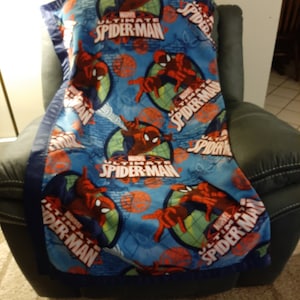 Spider Man,  Kids Fleece Blanket with a navy blue satin trim