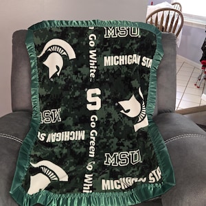 Michigan State University, Infant XL Crib Fleece Blanket with a green satin trim