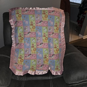 Baby zoo animals, Infant Crib Fleece blanket with matching pink, shimmering pink, light purple, green and rainbow satin trim