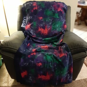Tie Dye, Multi Colored Tie Dye, teen/adult Fleece Blanket with a matching navy or royal blue satin trim
